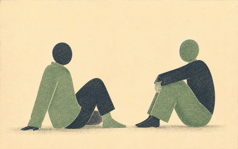 Two figures seated facing each other in an open composition with warm negative space — representing collaborative supervisory dialogue